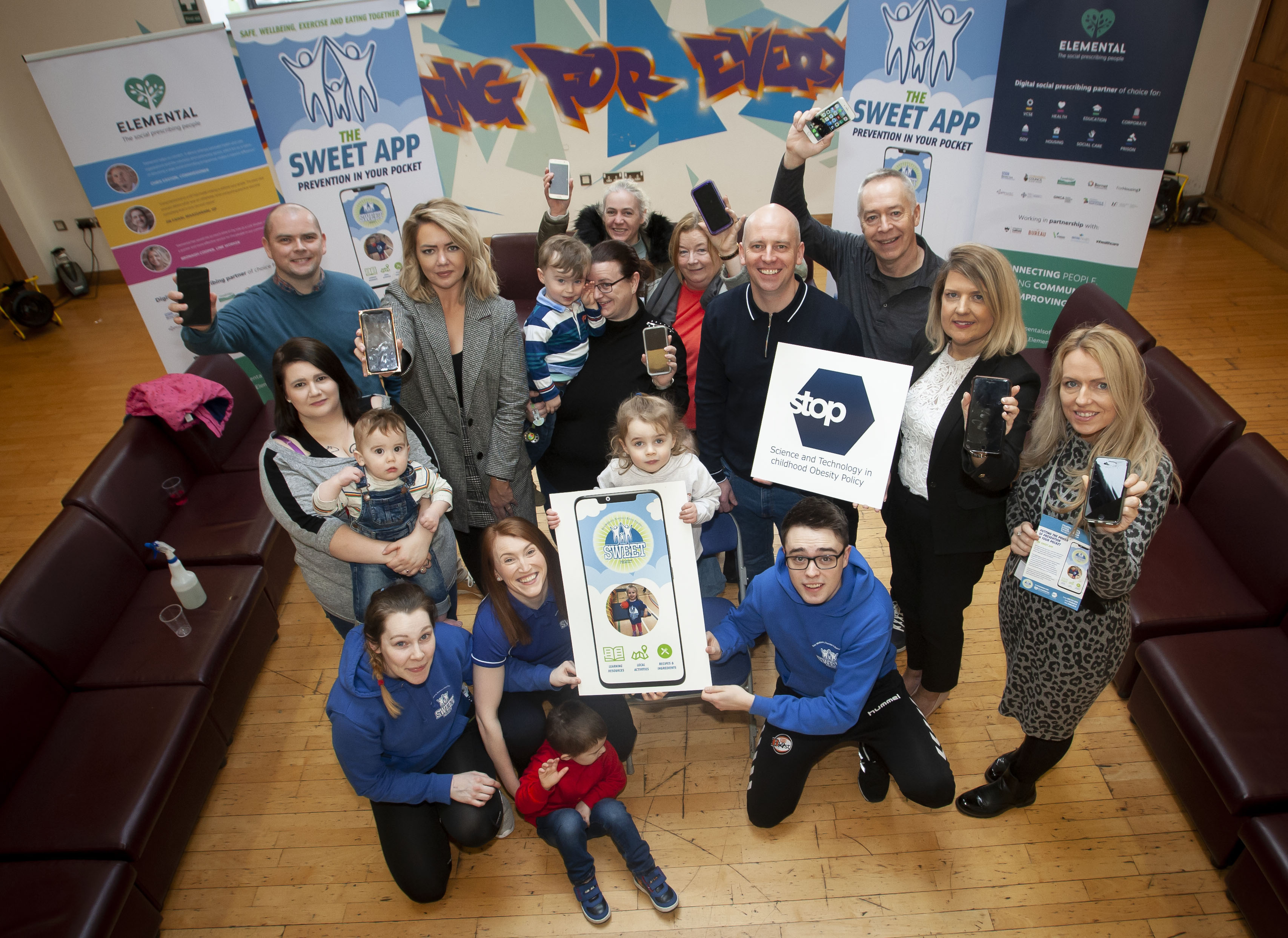 SWEET APP!. . . Group Pictured At The Old Library Trust On Friday Last For The Launch Of The Innovative New Project Aimed At Tackling Childhood Obesity. The SWEET App Is A Mobile Phone Spin Off Offering Real Time Support In Your Pocket, When And Where You Need It. Included In Photo Are Parents/grandparents And Children Who Will Avail Of The App, Along With George McGowan, Project Director, OLT, Phil Vickery And Serena Terry, COO, Elemental, Caomhan Logue, Ulster University, Julie White, SWEET Programme Manager And Roisin McDaid, OLT, And Deirdre McDaid, Manager, Surestart. (Photos: Jim McCafferty Photography)